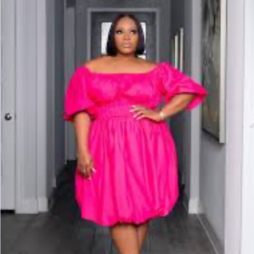 Vibrant Pink Puff Sleeve dress.